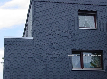 灰黑色瓦板外墙镶嵌砌花